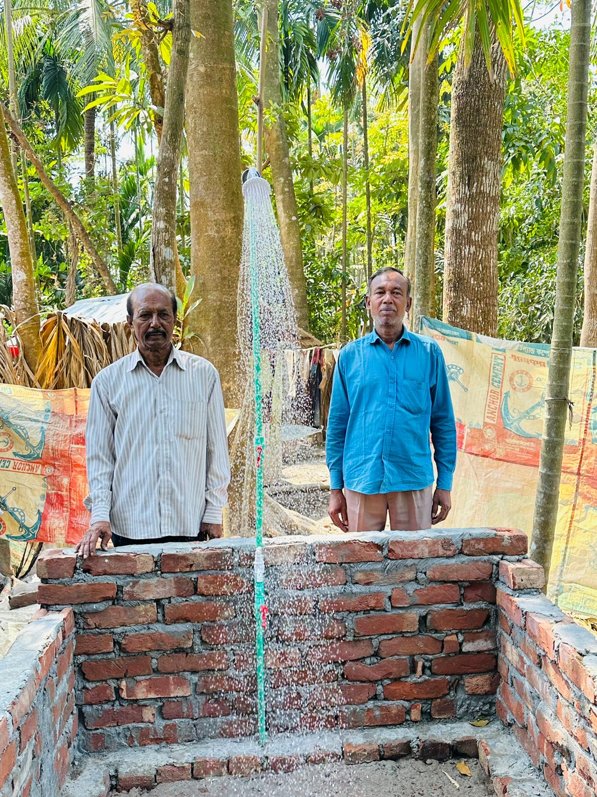Community members at a Max TapWater water point in Bangladesh