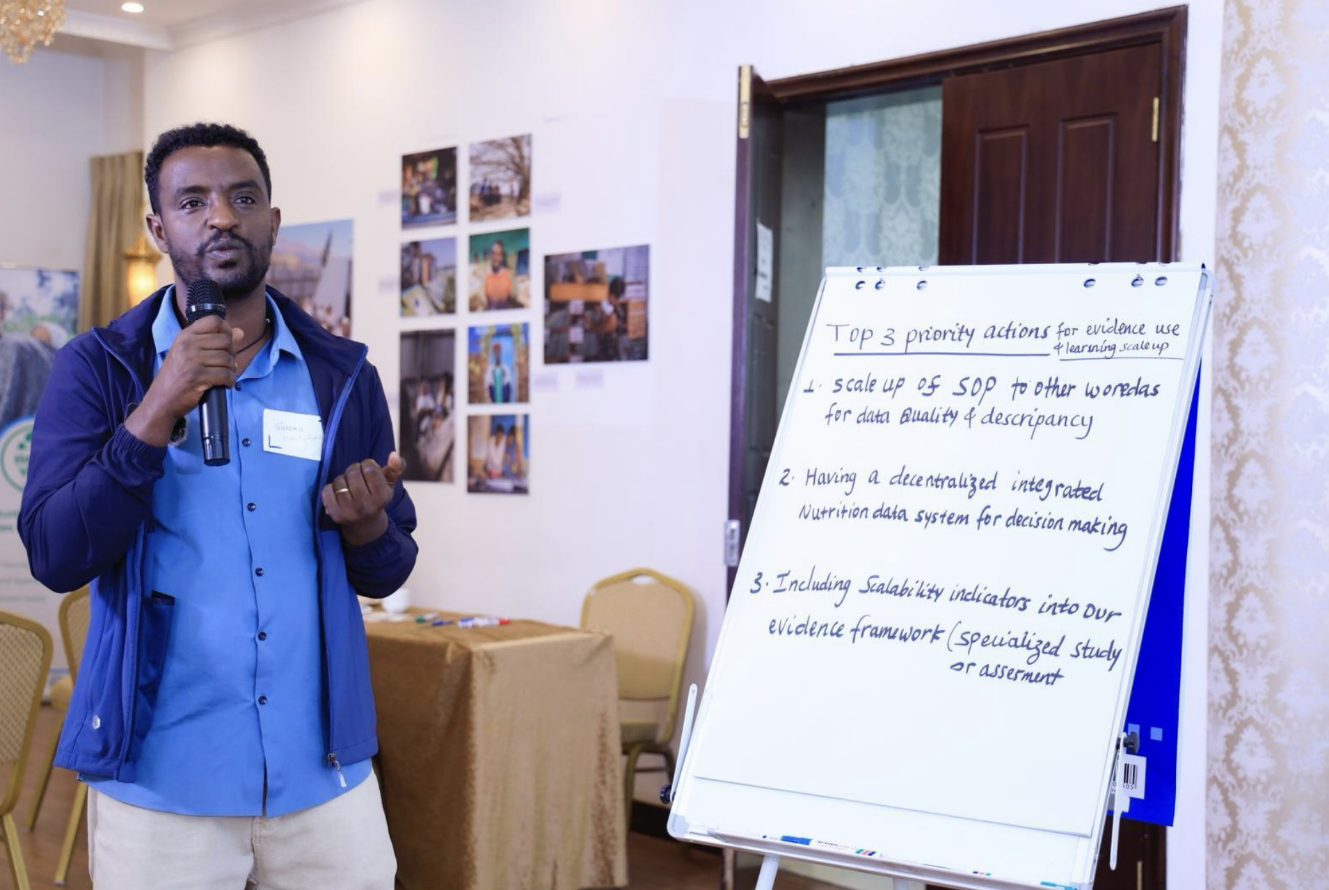 A small group round table discussion at a Healthy Village Programme workshop