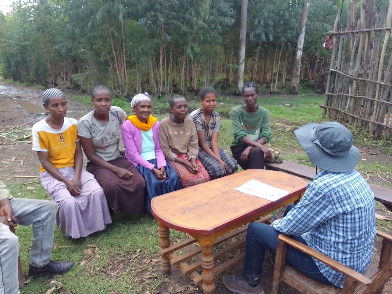 Community members and water committee representatives in a group discussion in Aleta Chuko